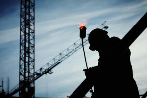 man working with a flame